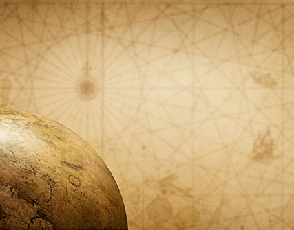 A vintage map, globe, and compass.